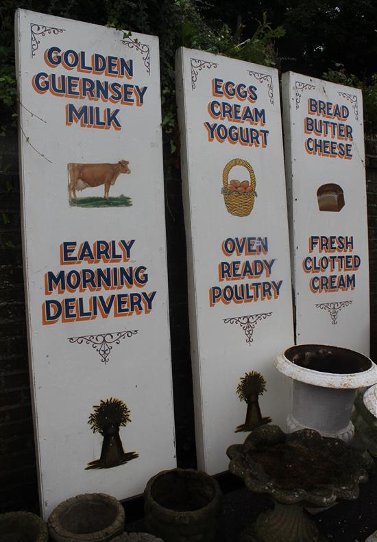 3 painted dairy signs